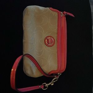 COACH signature zip canvas medium with hot pink patent piping wristlet.